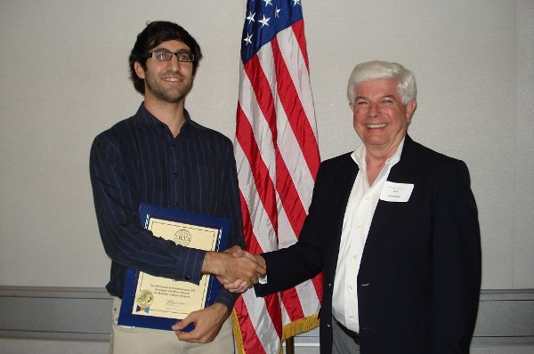 Bob Moorhead, chapter president (r) presents a certificate of appreciation to Jonathan Bennun, Cisco security product manager, for his talk on Internet security in August.