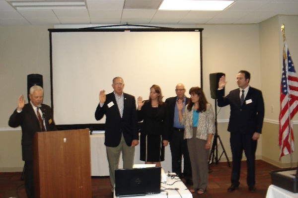 Northern California Regional Vice President Bob Landgraf (l) swears in new chapter officers in August. They include President Glenn Kesselman; Vice President Membership Kim Casey; Vice President Publicity Ron LaPedis; Vice President Operations Mary Buchanan; and Young AFCEAN Vice President Andrew Waters. Jeannette Bernardo, chapter secretary and treasurer, is not pictured.