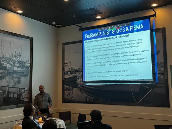 Garcia-Gordon discusses requirements for FedRAMP compliance at the November presentation at Scott's Seafood.