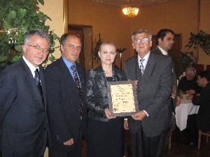 Tsveta Markova, chair of the State Commission on Information Security and new AFCEA member, receives a certificate at the chapter's spring conference in May.