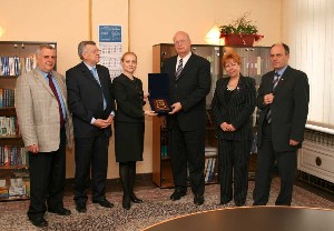 Kent R. Schneider (3rd from r), AFCEA International president and chief executive officer, receives the symbol of the Bulgarian State Commission at the chapter's April meeting. He is joined by (l-r) Stefan Stefanov, chapter board member; Col. Simeon Kralikov, BU A (Ret.), chapter president; Tsveta Markova, chairperson of the State Commission on Information Security (SCIS); Maria Vidolova, SCIS member; and Konstantin Zografov, AFCEA International regional vice president for the Mediterranean and Black Sea Region.