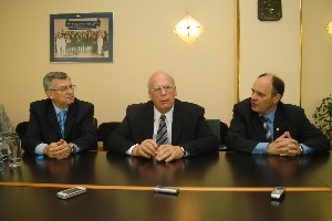Kralikov (l) and Zografov join Schneider (c) as he speaks to the chapter at a conference in April.