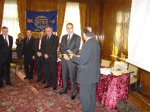 During the November conference, Col. Kralikov and Zografov present honorary AFCEA memberships to Pavlin Dimitrov, deputy prime minister and deputy minister of the interior; Tsvetanov; and Gen. Angelov.