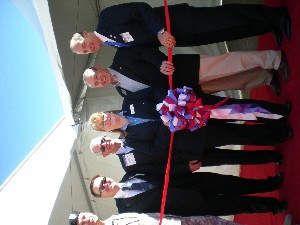 Cutting the ribbon to kick off the C4IST event in October are (l-r) Col. Michael Joiner, USA, chief of staff, U.S. Army Intelligence Center; Besselman; Lt. Gen. John A. Dubia, USA (Ret.), executive vice president, AFCEA International; a representative from Shay Saucedo, U.S. Congresswoman Gabrielle Giffords' office; Bob Strain, Sierra Vista Mayor; and Stu Carter, U.S. Army Network Enterprise Technology Command/9th Army Signal Command (NETCOM/9th ASC).