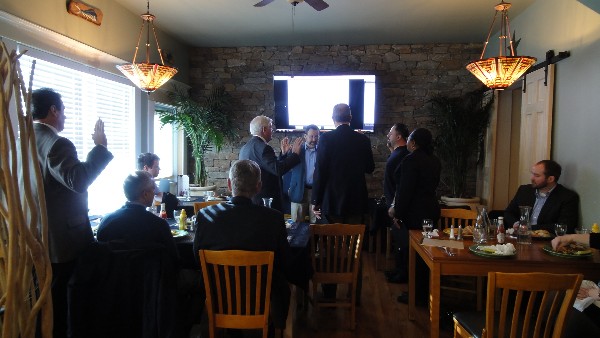 New officers take an oath during the chapter's January meeting.