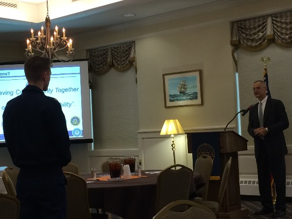 Thomas Michelli, USCG, deputy assistant commandant for C4IT and deputy chief information officer, answers a question from 1st Class Cadet Jasper Campbell during the chapter's October luncheon. 