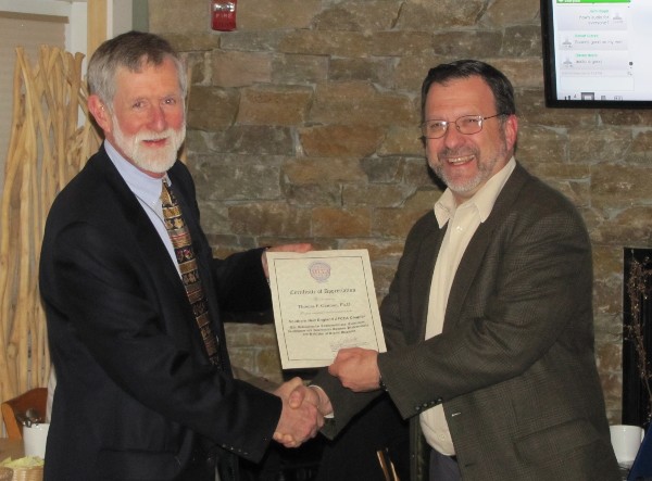 Thomas F. Gannon, Ph.D., professor of practice, Worcester Polytechnic Institute (l), receives a certificate of appreciation from Chapter President Lee Rossetti for his December presentation on architecture and design.