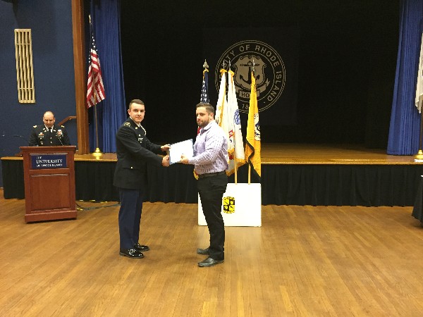 The Chapter's Director of Young AFCEANs Dave McCartens presents the Distinguished AFCEA Award to Cadet MS III Herman P. Hoffman, Jr., USA, Reserve Officers Training Corps at the ceremony in April. 