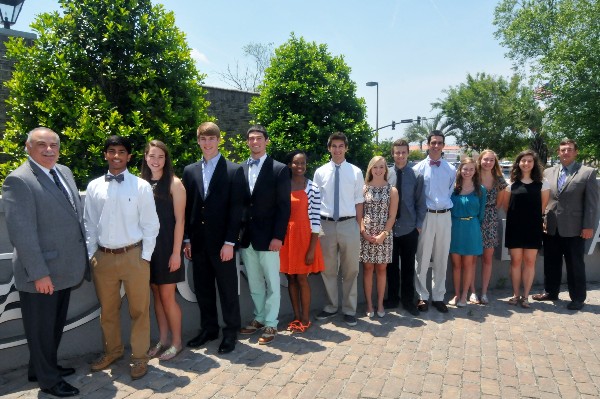 In May, Tony Orlando, chapter president (far l) and Zach Conover, chapter Education Committee chairman (far r), congratulate scholarship winners (l-r) Vijay Soni, Hanahan High School; Alta Hiott, First Baptist School; James Duncan, Northwood Academy; Bryce Kunkle, Berkeley High School; Jessica Mack, Fort Dorchester High School; James Huey, Porter-Gaud School; Morgan Ingerson, Stratford High School; Matthew Alford, Stratford High School; Michael Marshall, Ashley Ridge High School; Lauren Jackson, Berkeley High School; Caroline Churchill, James Island Charter High School; and Mary Welsh, Summerville High School. Scholarship recipients not pictured are Sean Carter, Olivia Coyle, and Samuel Lopez, all from Pinewood Academy.