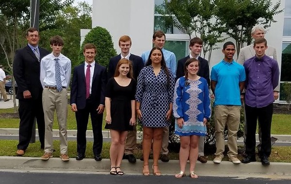 The chapter recognized the winners of its science, technology, engineering and mathematics (STEM) scholarships at a May event. Some of the recipients are pictured here.