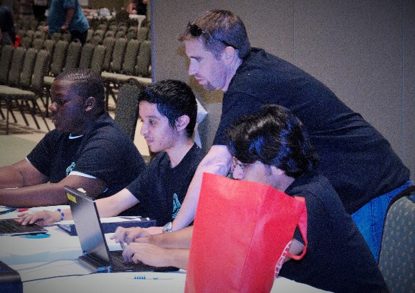High Schools receive mentoring from Space and Naval Warfare Systems Command Atlantic volunteers in April in preparation for the Palmetto Cyber Defense Competition.