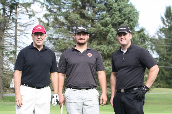 Defense Information Systems Agency (DISA) team members at the October golf tournament are (l-r) Jim Boynton, Devin Rickabaugh and Colby Rickabaugh.