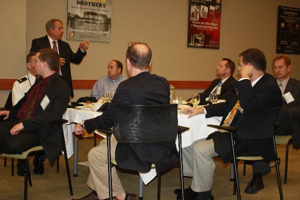 David DeVries, deputy Defense Department chief information officer for information enterprise, talks about managing information in a contested environment at the chapter's November luncheon.