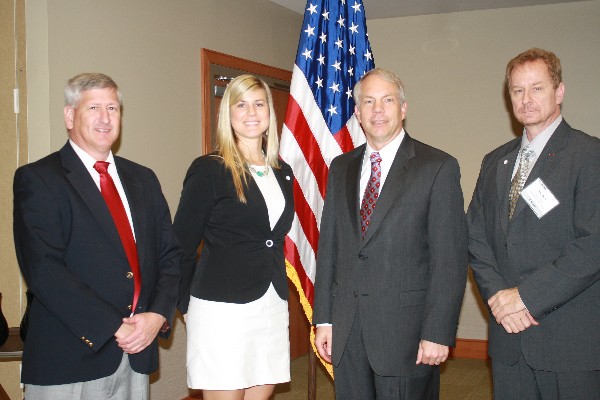 Together at the November luncheon are (l-r) John Jarvis, chapter executive vice president; Pam Plesz, chapter president; DeVries; and Patrick O'Brien, chapter treasurer.