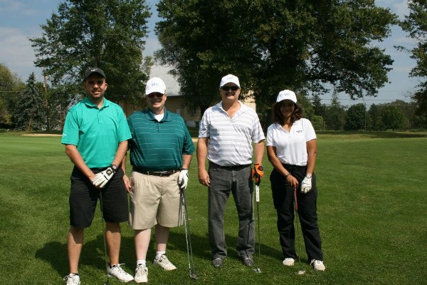 Participating in the chapter's September golf tournament are (from l) Chris Pereschuk of NOVA; Fred Rice of SAIC; Bill Goodman of SAIC; and Carla Thornton of SAIC.