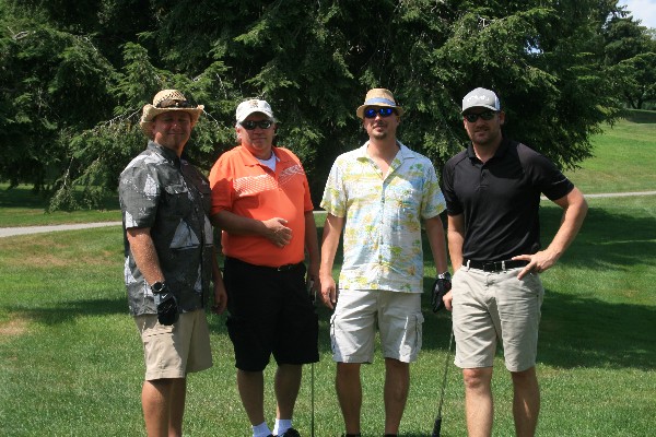 Champions of the chapter's 6th annual golf tournament in August are (l-r) Ron Plesz, NOVA; Bill Schoenleber, NOVA; Patrick McGuire, Merrill Lynch; and Jordan Webber, DISA.