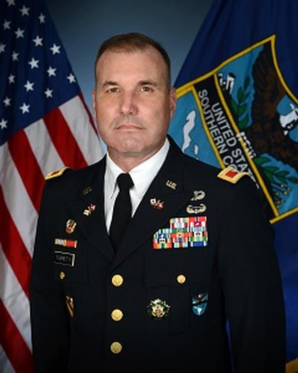 Col. James Turinetti, USA, chief information officer and director, J-6 Communication Systems Directorate, U.S. Southern Command, speaks at the chapter's March event.