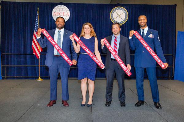 Sgt. Keitt (far l) poses with Shawn Cressman, chapter vice president of Young AFCEANs (c), and other winners at WEST 2020 in March.