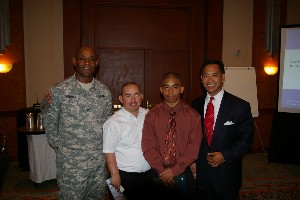 Col. Herb Newman, USA (l), chapter president, meets with scholarship winners during the May luncheon, including Master Sgt. Manuel Rodriguez, parent of scholarship recipient Emmanuel Rodriguez (3rd from l) and Dr. Ben Amaba, guest speaker.