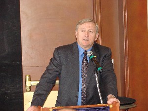 Maj. Gen. J. David Bryan, USA (Ret.), president, Defense Systems Group, ManTech, and AFCEA Educational Foundation board member, thanks the chapter for its $5,000 contribution at the May luncheon.