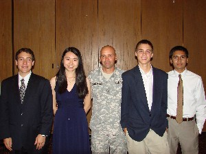 In April, Col. Churchwell (c) presents scholarships to Joseph Veingrad (l), Shelly Jin (2nd from l), Chance Churchwell (2nd from r) and Amir Ferouz.