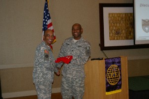 Gen. Bivens (l) accepts a South Florida Chapter polo shirt as a guest speaker gift from Col. Newman after the June chapter luncheon.