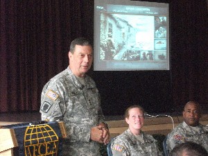 Lt. Gen. Carroll F. Pollett, USA, director, Defense Information Systems Agency, speaks to the chapter in August.