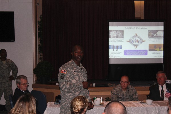 Brig. Gen. Bruce T. Crawford, USA, director J-6 command, control, communications and computers/cyber, United States European Command, discusses the Supreme Allied Commander Europe's priorities at the October luncheon.