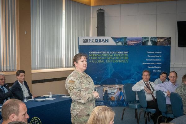 In April, Chapter President Col. Robin Gibson, USAF, addresses luncheon attendees and introduces the guest speaker, U.S. Department of Defense Chief Information Officer Dana Deasy.