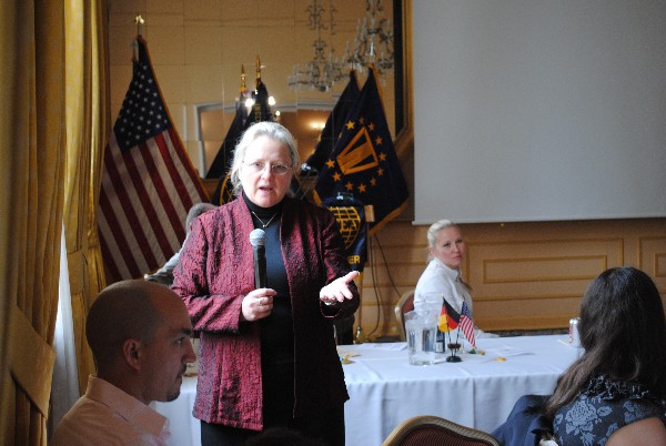 Cindy Moran, Director of the Network Services Directorate at the Defense Information Systems Agency, addresses a full house at the Swabian Special Events Center in April.