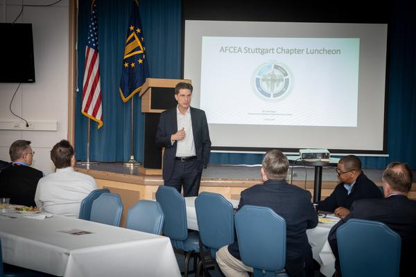 Department of Defense Chief Information Officer Dana Deasy speaks to the luncheon attendees about the four tenets of digital modernization during the April event.