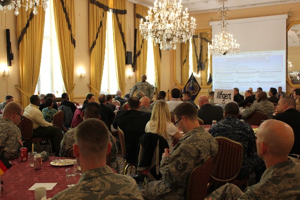 Col. Price fields questions from the audience at the June luncheon.