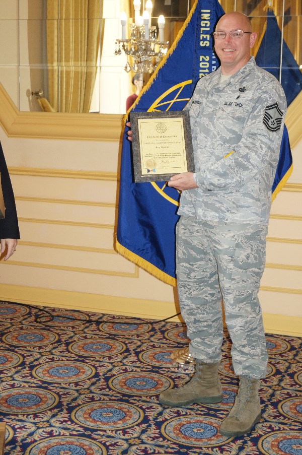 Senior Master Sgt. Steven Schwerdtfeger, USAF, receives his Life Membership Certificate in April.