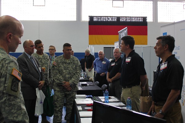 In July, expo attendees receive information from exhibitors.