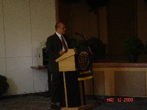 Ratliff answers questions after his presentation during the July scholarship awards presentation.