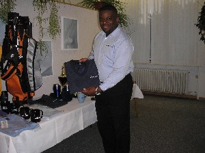 John Tyler is all smiles as a volunteer at the event to help setup for all the early participants.  