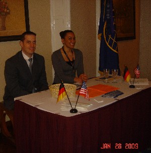 Tatiaunna Maldonado, chapter vice president for membership and recent Distinguished Young AFCEAN award winner, and Sam Milford, staff manager, Defense Information Systems Agency Europe, manage the membership and information table at the tech expo, held in January. They helped to recruit members and promote the benefits of membership.