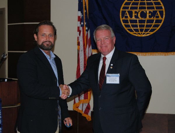 In September, Capt. Gerry Slevin, USN (Ret.), chapter first vice president (r), welcomes guest speaker welcomed Dan O'Shea, vice president of Personnel Recovery, Kidnap & Ransom at GROM Technologies Incorporated.