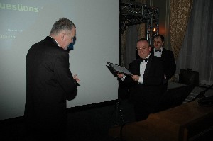 Commodore RNLN Willem Voogt, President of Chapter The Hague, presents a Certificate-of-Appreciation to Mr. Toon Akkermans, President and CEO of the NCIM Group for his presentation and for hosting the Afcea Chapter The Hague Annual Dinner 2007