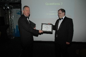 Commodore RNLN Willem Voogt, President of Chapter The Hague, presents a Certificate-of-Appreciation to the main speaker Mr. Thomas Kreitmar,
Principal Scientist at the NATO C3 Agency for his Presentation on the NATO Project MAJIIC
