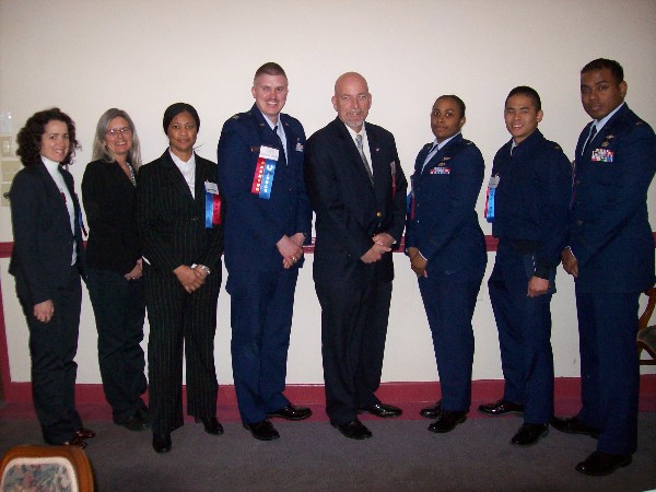 Rick Beard (c) joins chapter volunteer judges at the March Tidewater Science and Engineering Fair, including (l-r) Stephanie Luzzie; Paula McPhee; 2nd Lt. Dalton Nguyen, USAF; Capt. Trek Potter, USAF; 2nd Lt. Keisha Salandy, USAF; Capt. Philip Wachlin, USAF; and 1st Lt. Edward Wilson Jr., USAF.