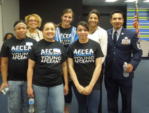 Attending the Hour of Code event in May are (front row, l-r) Airman 1st Class Taylor Herbert, USAF; Staff Sgt. Anita Carrero, USAF; Senior Airman Kayla Warren, USAF; (back row, l-r) Nan Williams, Calvary Christian Academy principal; Senior Airman Kylie Subjinske, USAF; Dr. Darilyn Mercadel, early childhood education consultant; and Master Sgt. Elias Garcia, USAF.