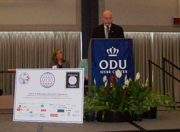 Beard presents the chapter's category awards at the Tidewater Science and Engineering Fair in March. 