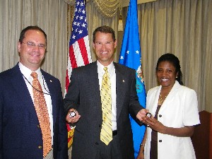 In June, Marion (c) recognizes Makeva Flowers and Steve Simkins as the chapter's AFCEANs of the Month for May and June, respectively.