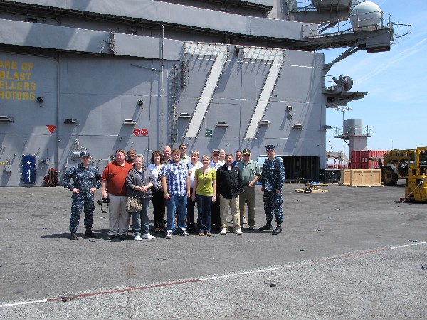 AFCEA chapter members and staff tour the USS George H.W. Bush in May as part of a guided tour arranged by the U.S. Fleet Forces Command.