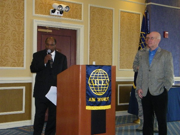 Cleveland White (l) and Jerry Wright, president of the Hampton Roads Association for Unmanned Vehicle Systems International (AUVSI), provide a presentation on the Mid-Atlantic Aviation Partnership (MAAP) during the chapter's January luncheon. This is part of the Federal Aviation Administration's (FAA's) Modernization and Reform Act of 2012 that established a program to integrate UAS into the National Air Space. The FAA selected Virginia Tech as one of six test sites that will conduct UAS failure mode testing and identify and evaluate operational and technical risks areas.