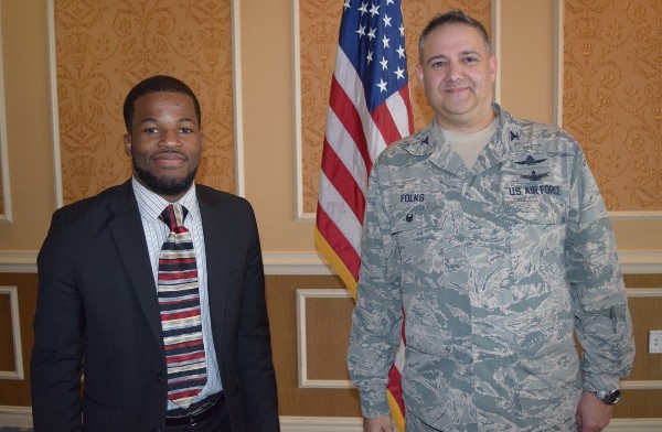 Young AFCEAN of the Month for February Matthew Hester and Col. Folks pose after the luncheon.