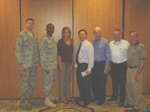 Maj. Rook; Capt. Scott Schumaker, USAF, board of directors, Tucson Chapter; Shari Brabham, chapter secretary, Tucson Chapter; Richard Besselman, chapter president, Southern Arizona Chapter; Thomas Flannery, board of directors, Tucson Chapter; Harry Bowen, small business liaison, Southern Arizona Chapter; and Larry Bingaman, deputy regional vice president, network after the August meeting.