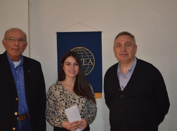 In February , Col. I. Bora Buyukoner, TUA (Ret.), chapter president (l) and Erdinc Oguz, chapter treasurer, present a $1,000 Science, Technology, Engineering and Mathematics (STEM) Award to Bahar Cihan, teacher at Kamisli Village Elementary and Middle School.