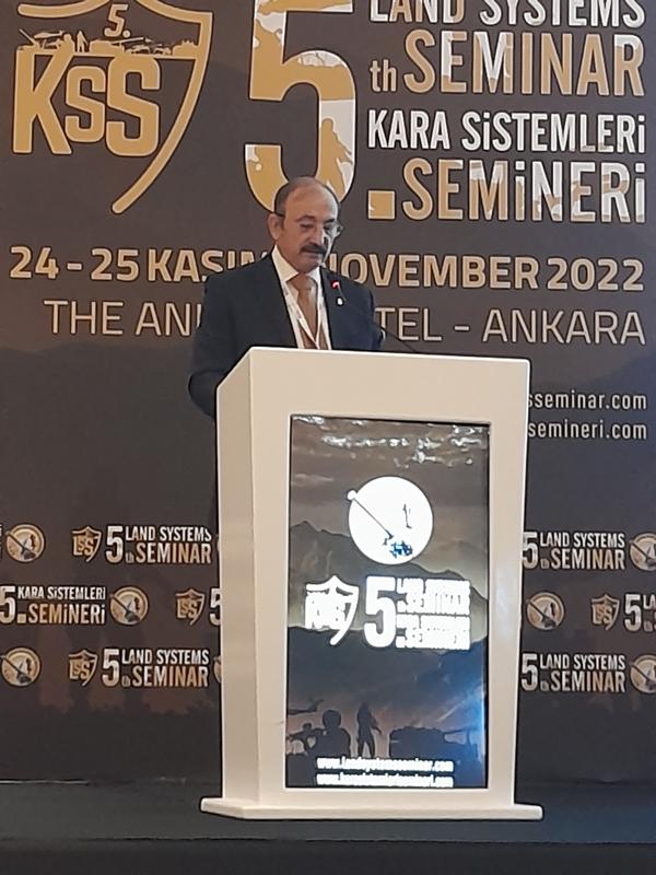 Chapter President Kamil Zafer Selcuk promotes AFCEA at the November seminar.